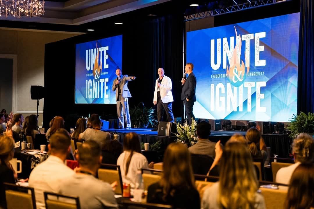 Jerry participating in an onstage conversation at Unite and Ignite